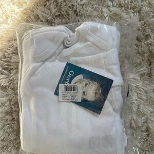 6 brand new onesie sets